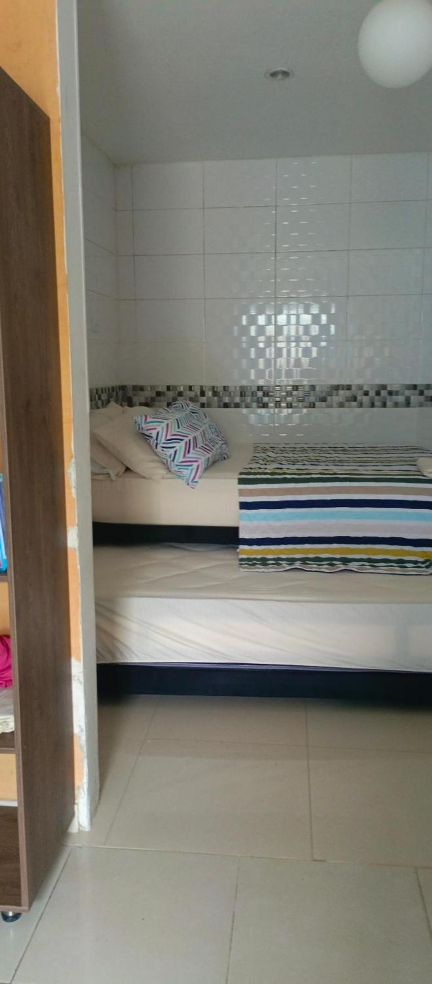 Apartahotel Eden Coveñas Pokoj fotografie